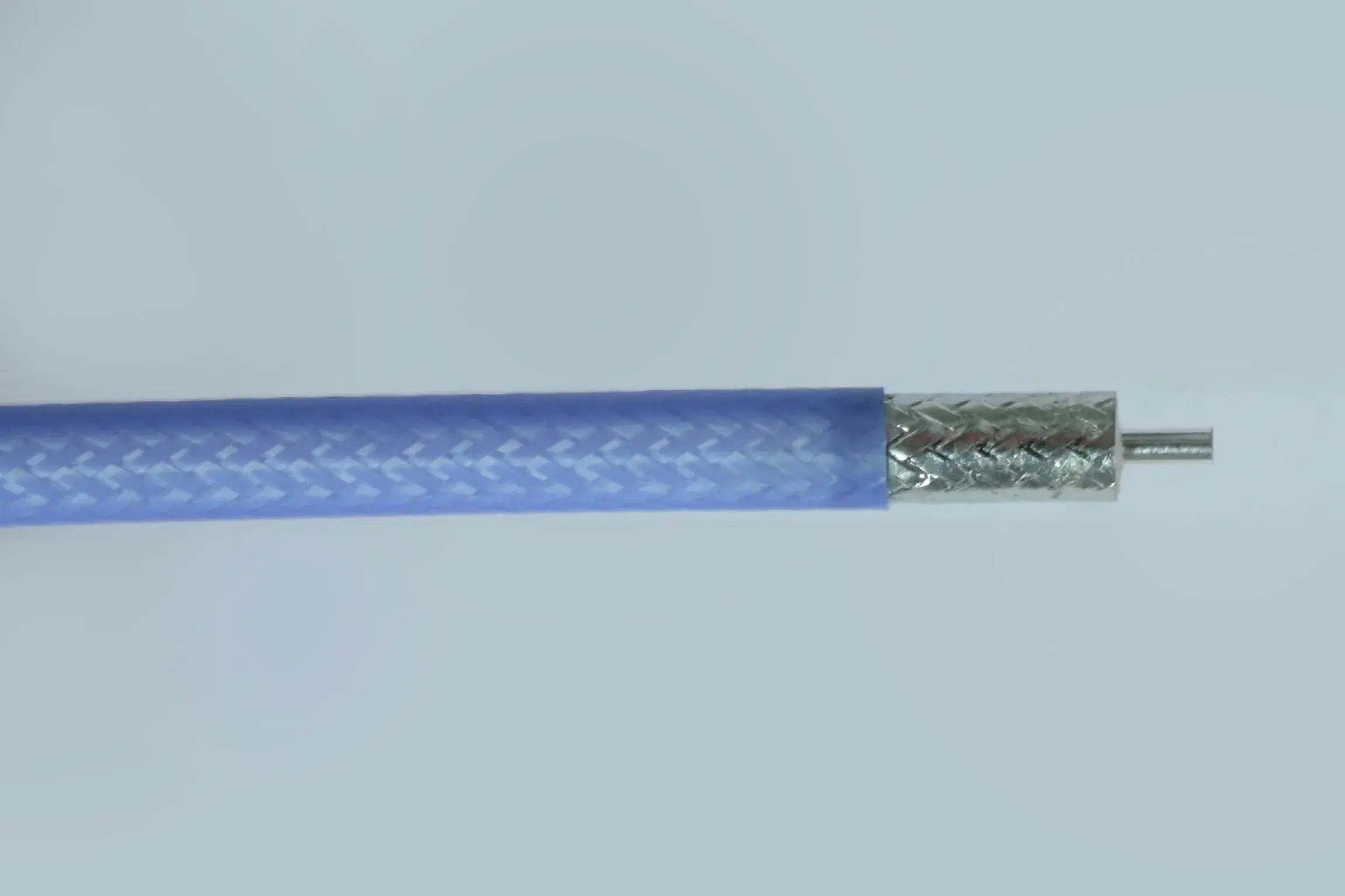Blue colored wrapper for silver colored wire.